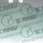 LH FRONT DOOR GLASS GREEN (6 HOLES)